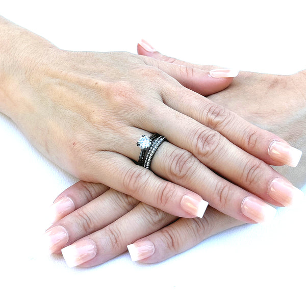 Juego de 2 anillos de boda para mujer de acero inoxidable IP negro claro con circonita cúbica de corte redondo de 7 x 7 mm
